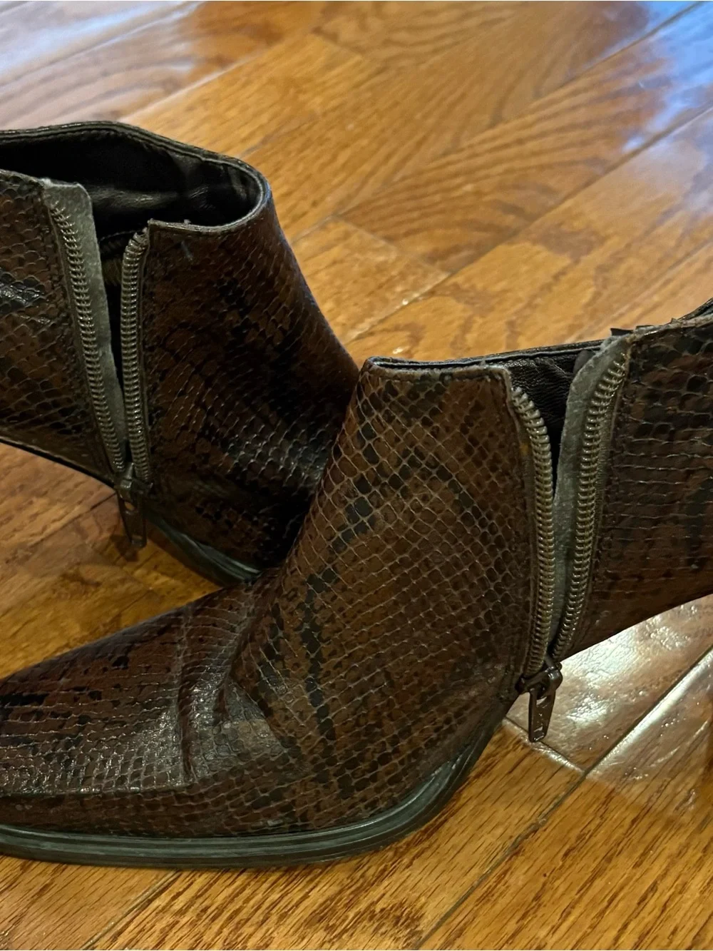 Nine West brown snake embossed square toe leather ankle boot.